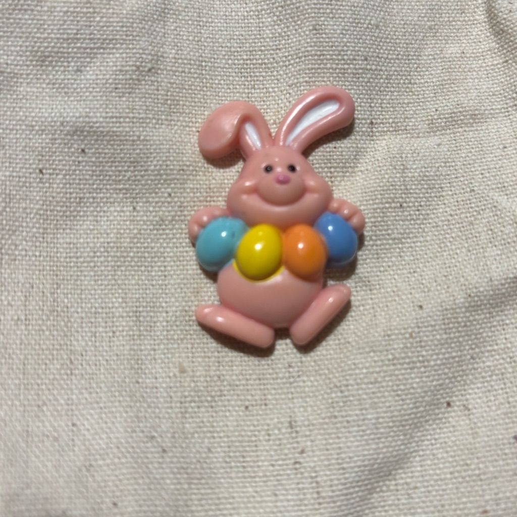 Russ Vintage Pink Plastic Easter Bunny Rabbit Pin Or Brooch Holding Colored Eggs